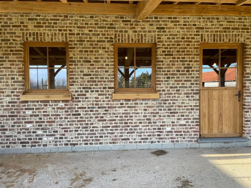 Eiken houten buitendeur geplaatst door schrijnwerker Bongaerts D. in Bree