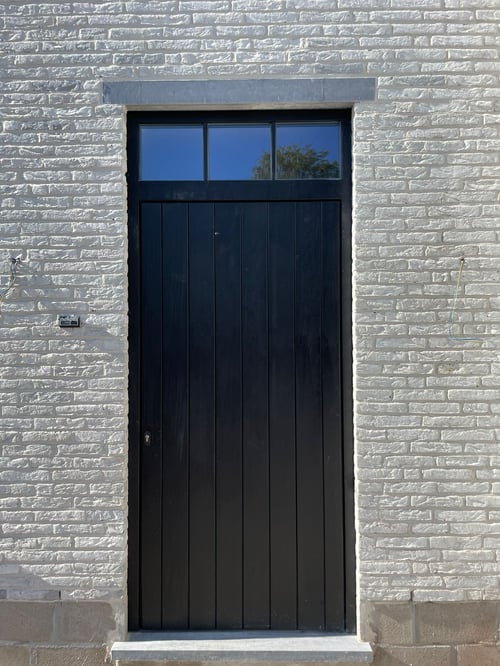 Padouk houten buitendeur geplaatst door schrijnwerker Bongaerts D. in Eigenbilzen