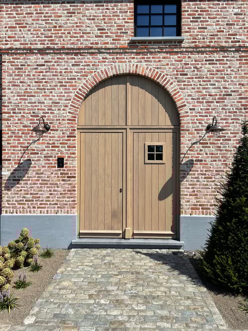 Afrormosia houten buitendeur geplaatst door schrijnwerker Bongaerts D. in Hechtel-Eksel