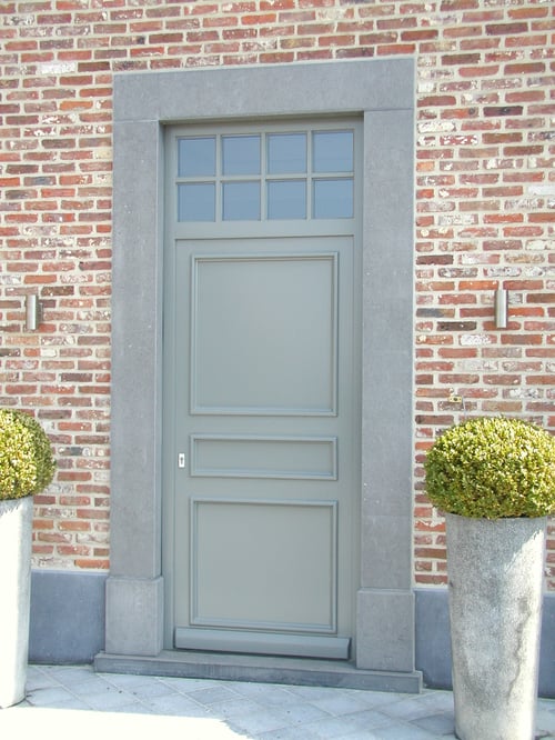 Afrormosia houten buitendeur geplaatst door schrijnwerker Bongaerts D. in As