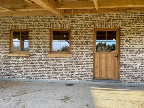 Eiken houten ramen geplaatst door schrijnwerker Bongaerts D. in Bree