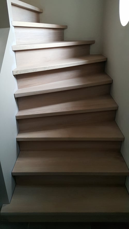 Eiken trapbekleding geplaatst door schrijnwerker Bongaerts D. in Neerglabbeek